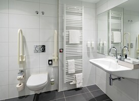 Eco-friendly toiletries, hair dryer, towels, shampoo