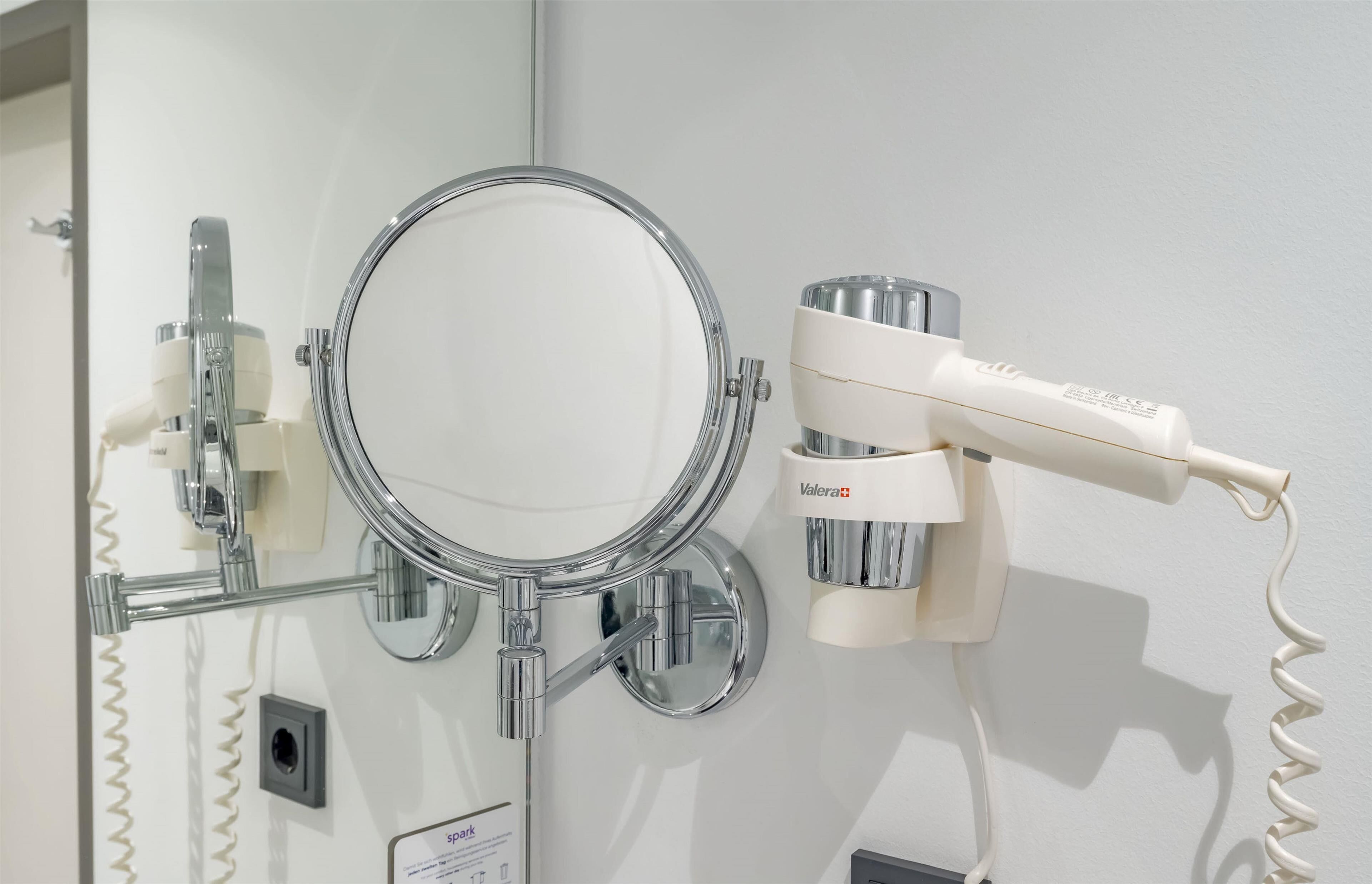 eco-friendly toiletries, hair dryer, towels, shampoo