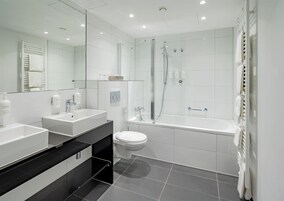 Room, 1 King Bed with Sofa bed | Bathroom shower