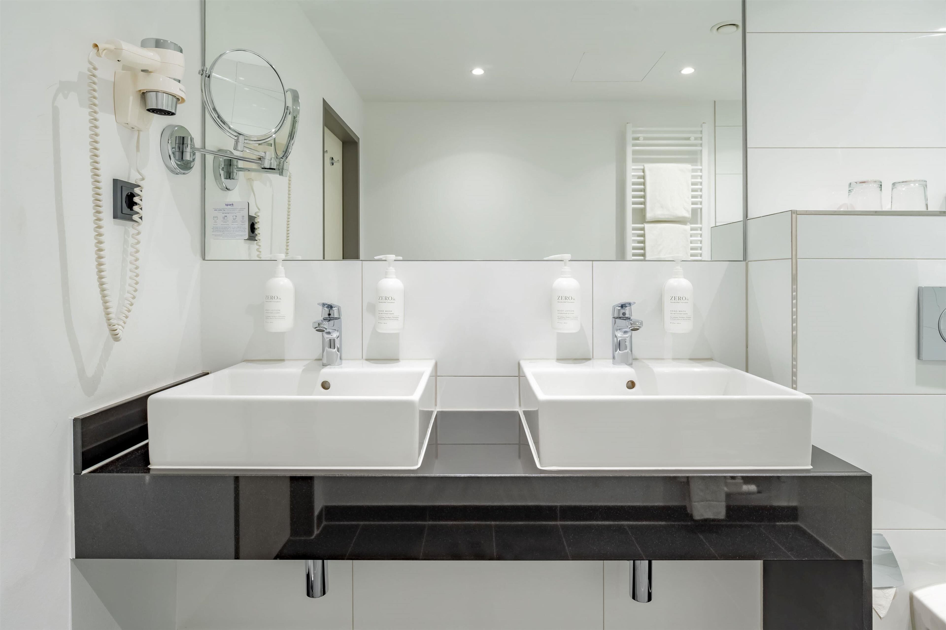 room, 1 king bed with sofa bed | bathroom | eco-friendly toiletries, hair dryer, towels, shampoo