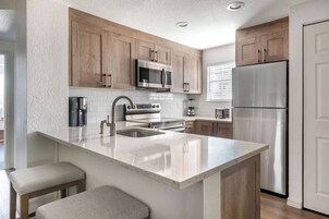 Microwave, stovetop, dishwasher, coffee/tea maker