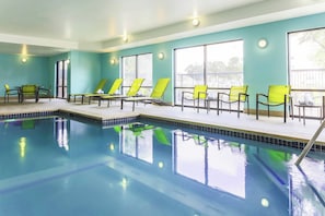 Indoor pool, open 6 AM to 11 PM, pool umbrellas, pool loungers