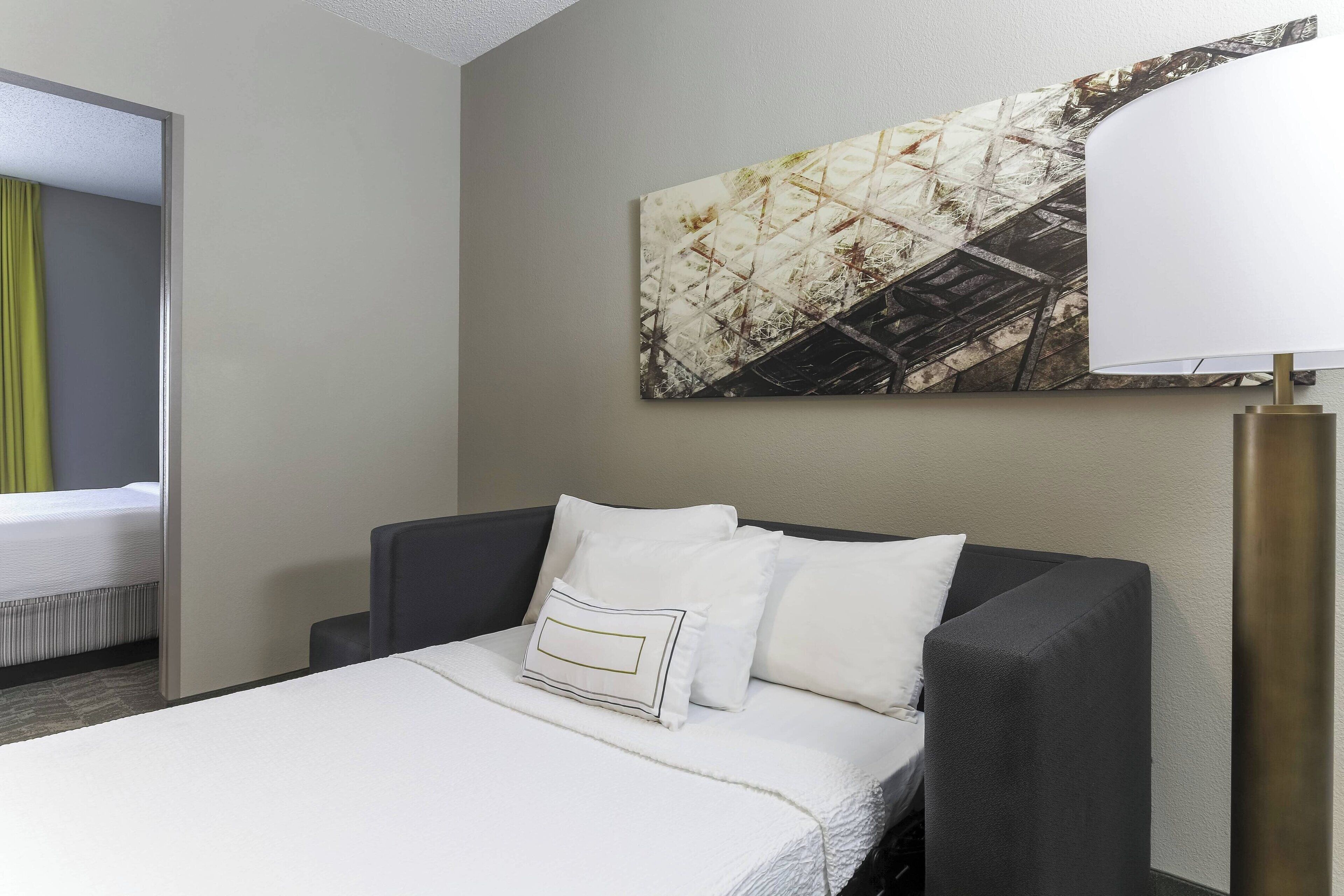 pillow-top beds, desk, blackout curtains, iron/ironing board