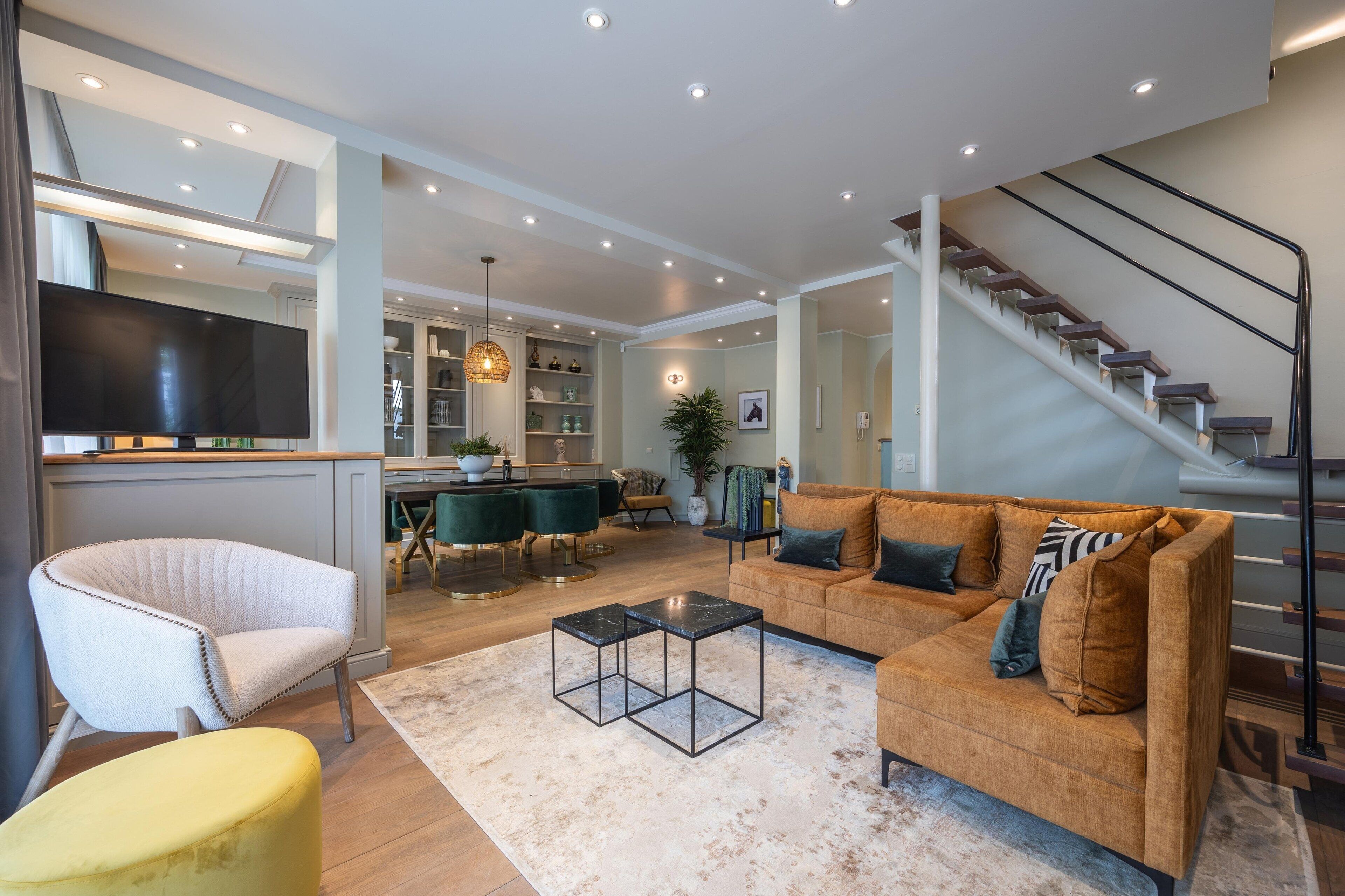 triplex apartment | living area | 38-inch flat-screen tv with cable channels