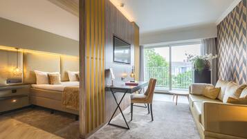 Habitación Deluxe, 1 cama matrimonial | Ropa de cama de alta calidad y minibar
