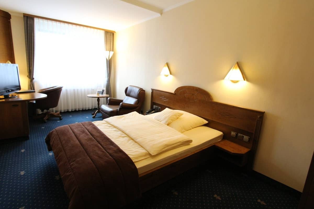 Chambre Simple Confort | Literie de qualité supérieure, minibar, coffres-forts dans les chambres