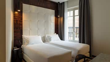 Ropa de cama de alta calidad y minibar