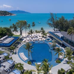 On the beach, white sand, beach umbrellas, beach towels