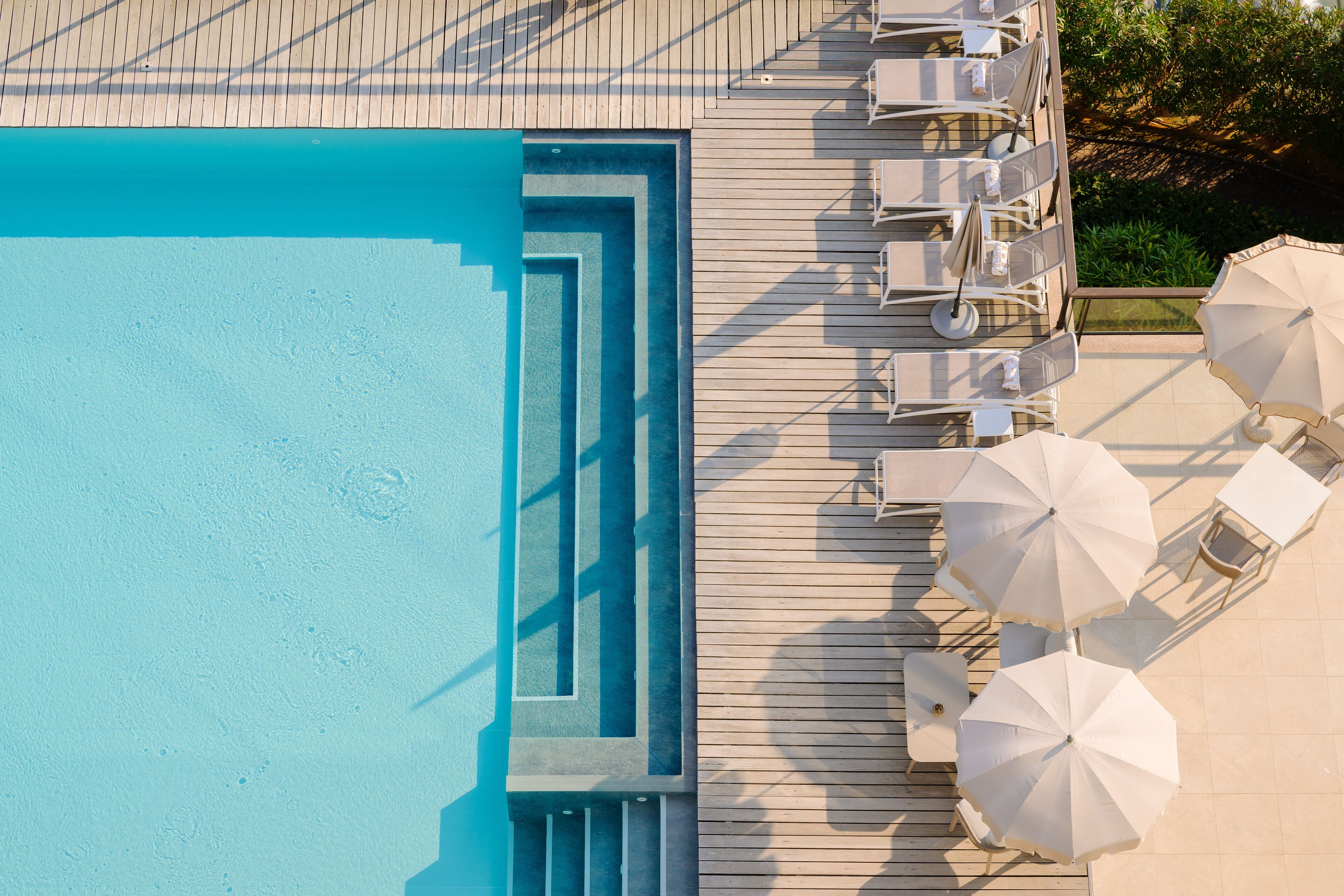 Seasonal outdoor pool, pool umbrellas, pool loungers