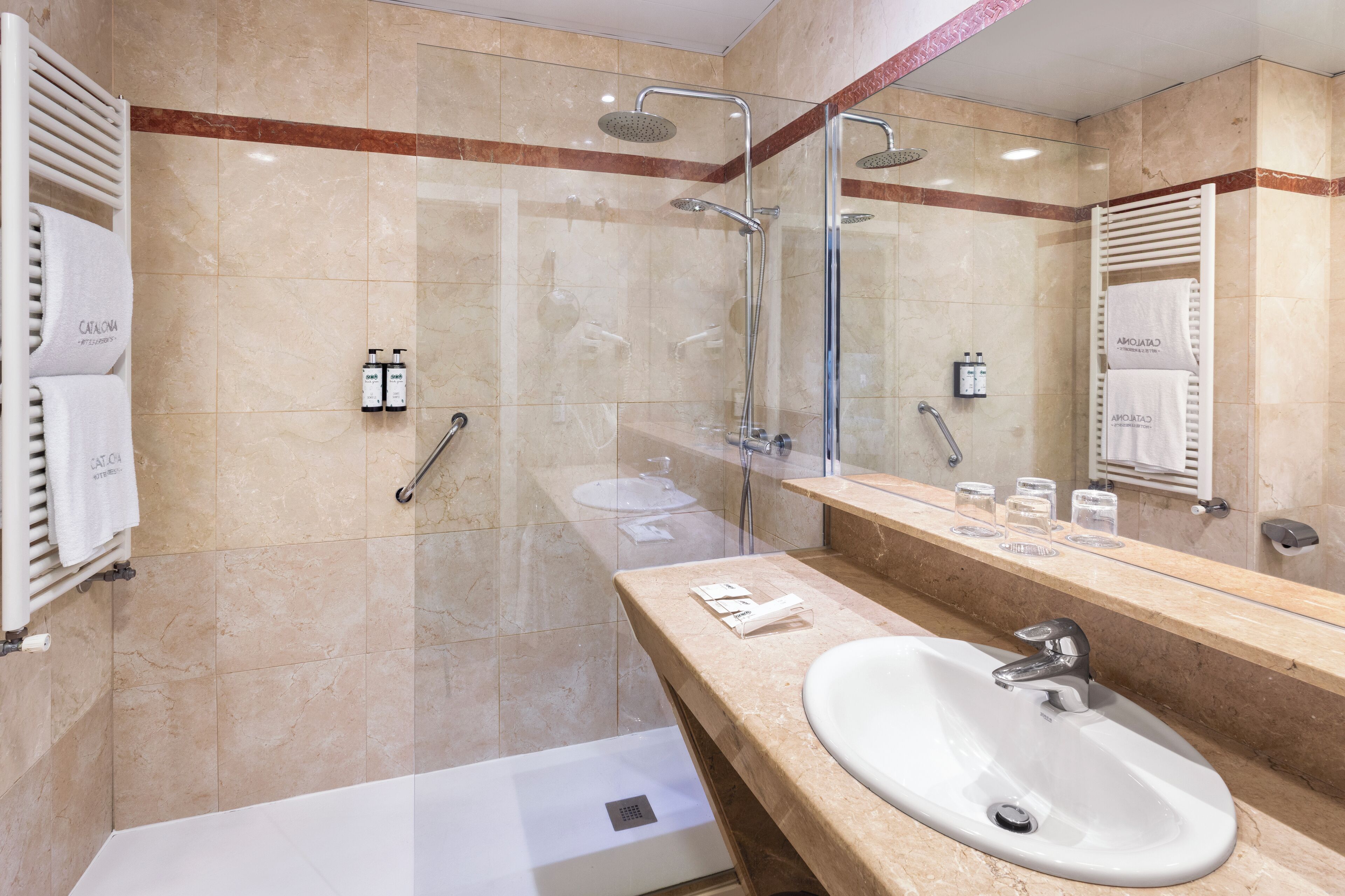 eco-friendly toiletries, hair dryer, towels