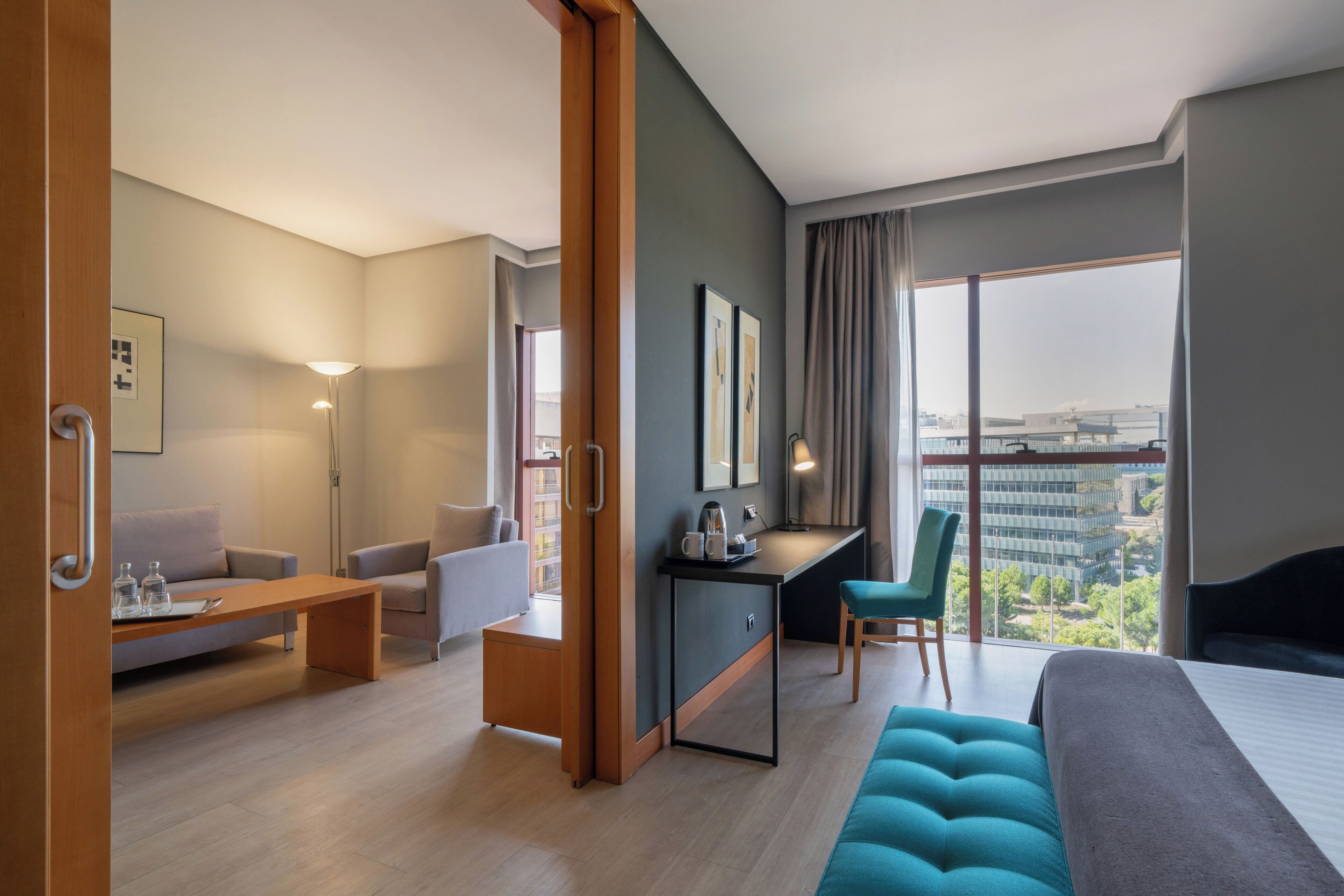 Deluxe Suite | Down comforters, minibar, in-room safe, desk