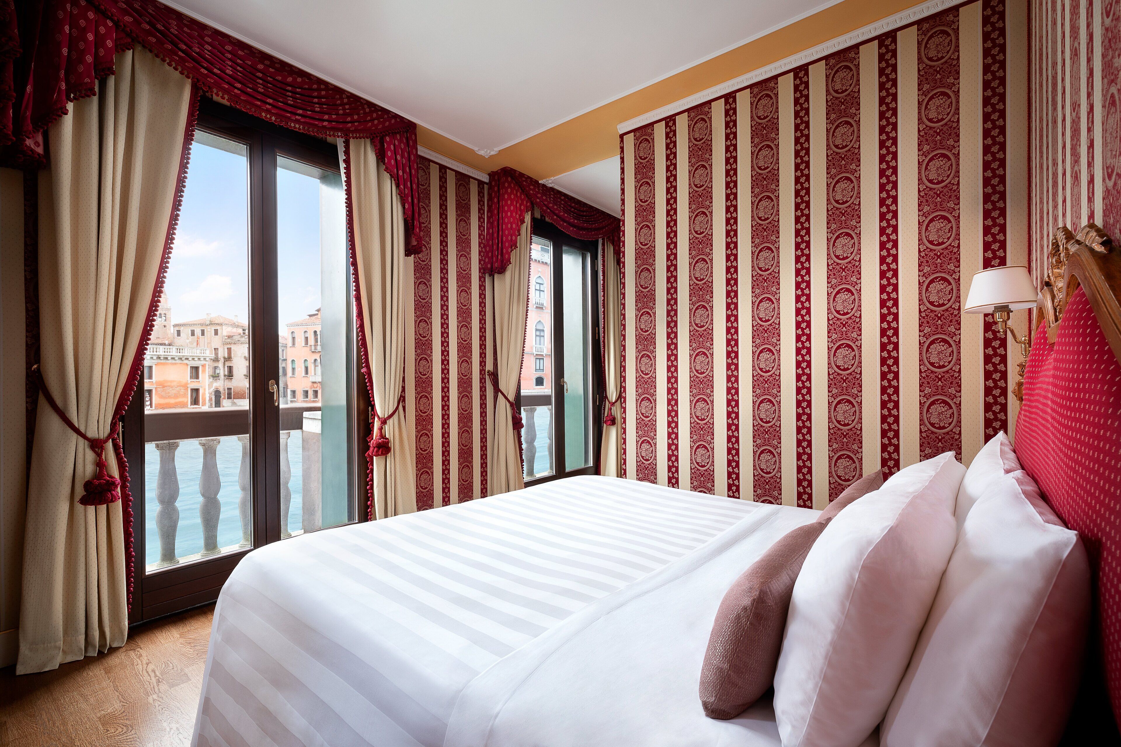 deluxe suite, canal view, overwater | free minibar items, in-room safe, desk, laptop workspace