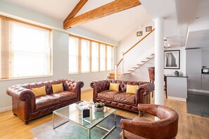 Signature Apartment, 2 Bedrooms, City View | Living area | LCD TV, DVD player