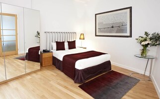 Standard Apartment, Private Bathroom | In-room safe, desk, iron/ironing board, bed sheets