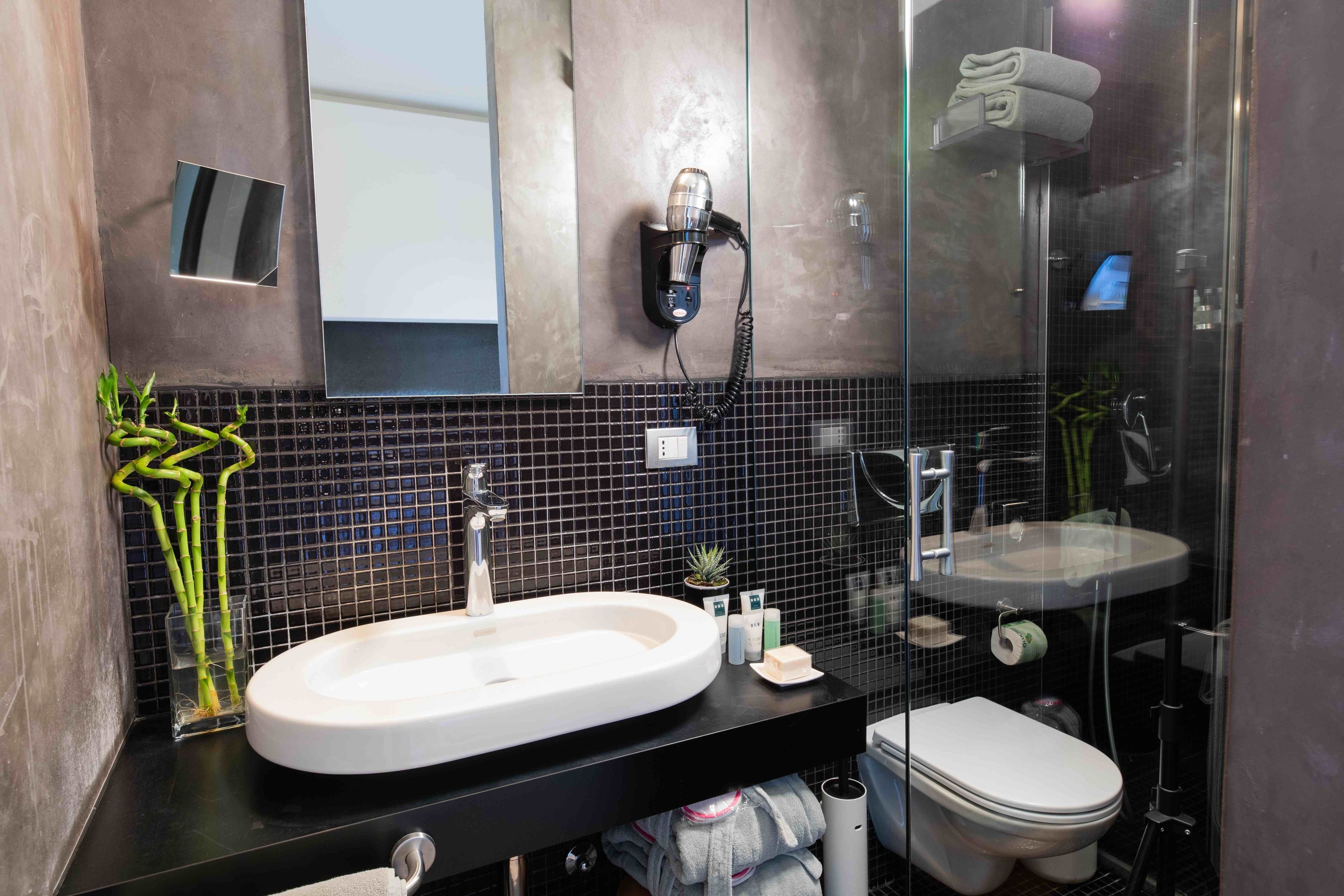 shower, rainfall showerhead, designer toiletries, hair dryer