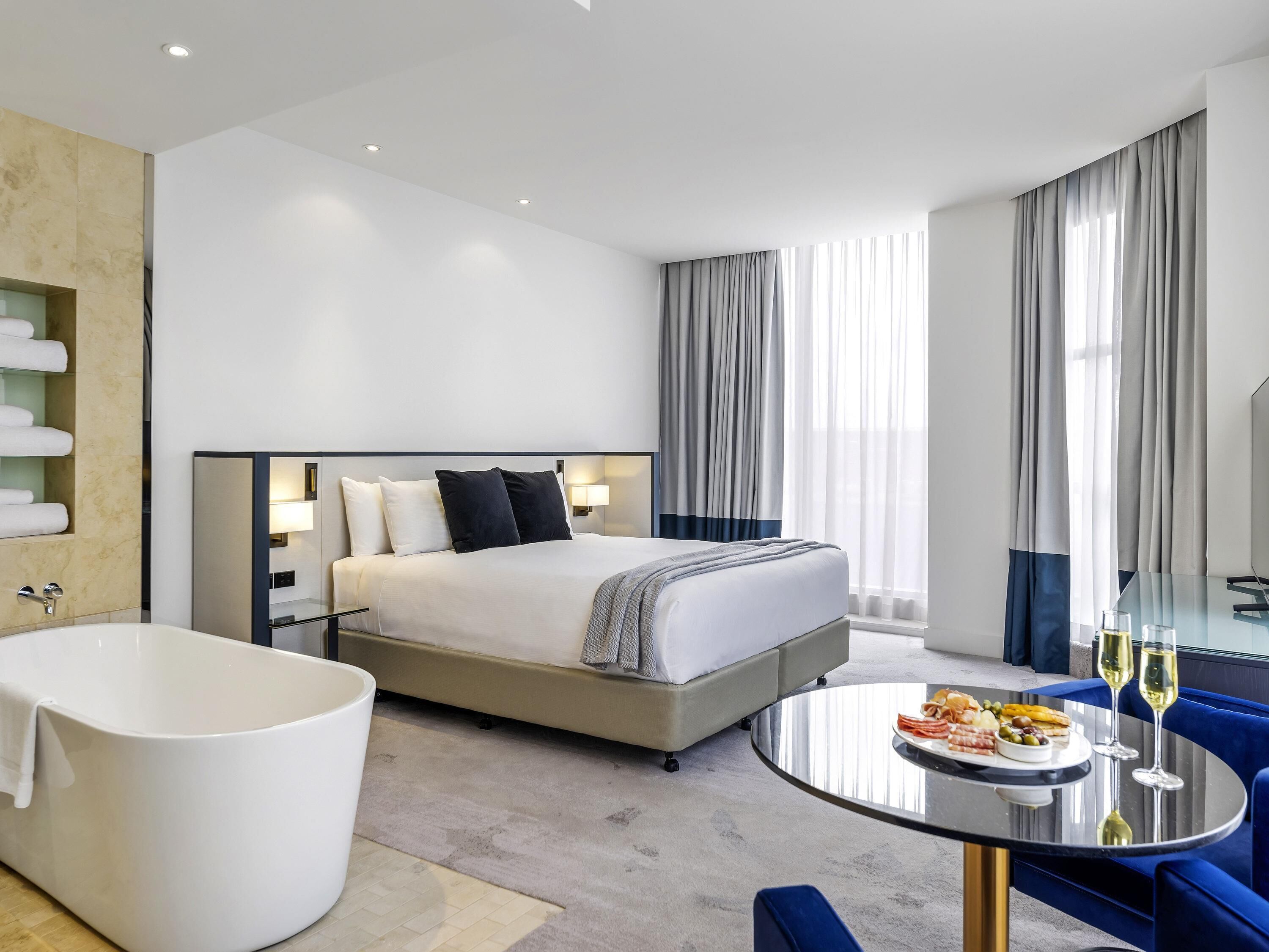 Premium bedding, pillow-top beds, minibar, in-room safe