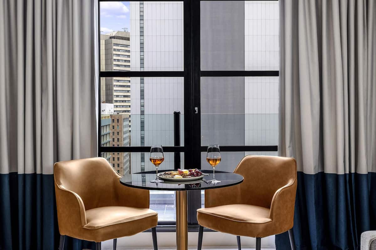 Premium bedding, pillow-top beds, minibar, in-room safe