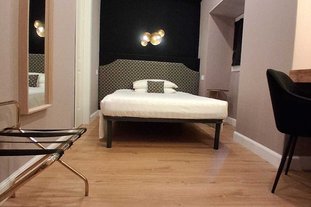 Economy Room | Minibar, desk, free WiFi, bed sheets