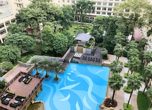 Outdoor pool, open 9:00 AM to 9:00 PM, pool umbrellas, sun loungers