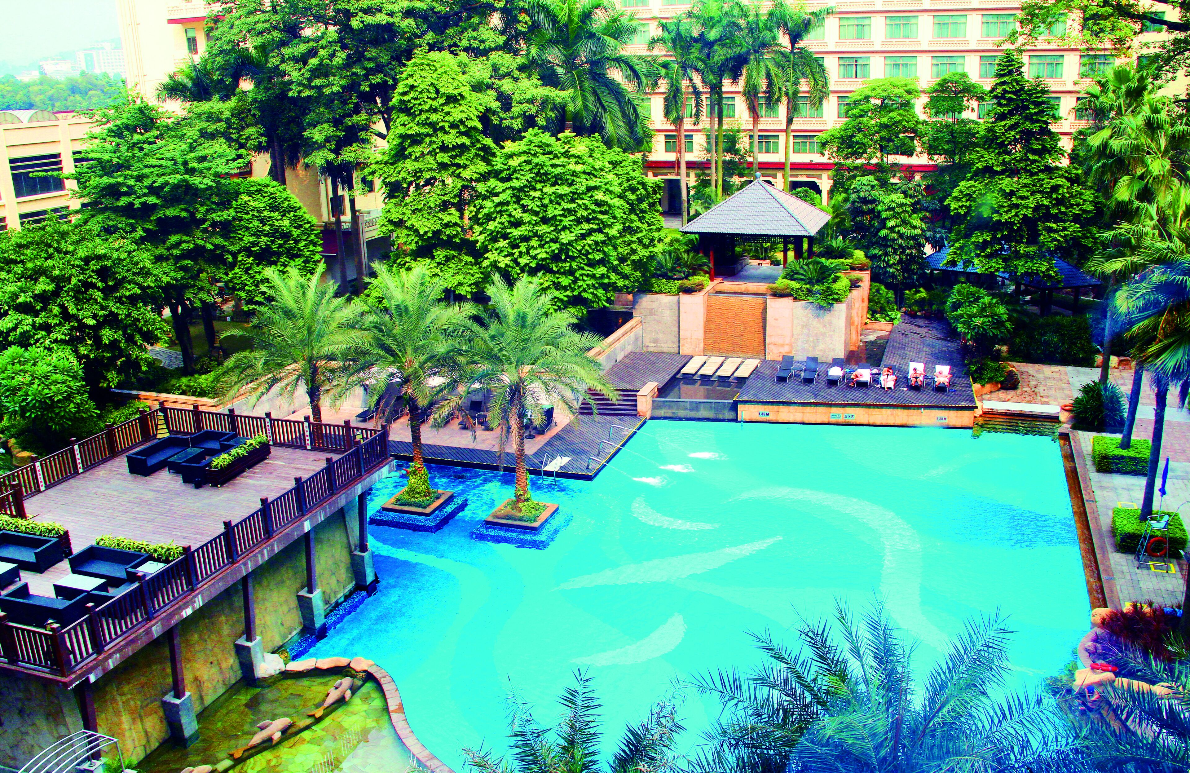 Outdoor pool, open 7:30 AM to 9:00 PM, pool umbrellas, pool loungers