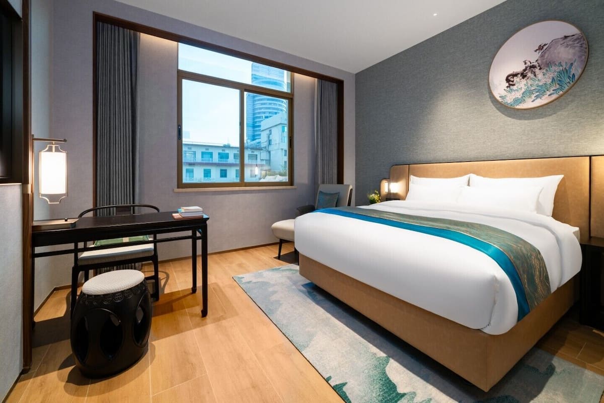 Deluxe King Bed Room | Premium bedding, in-room safe, desk, laptop workspace