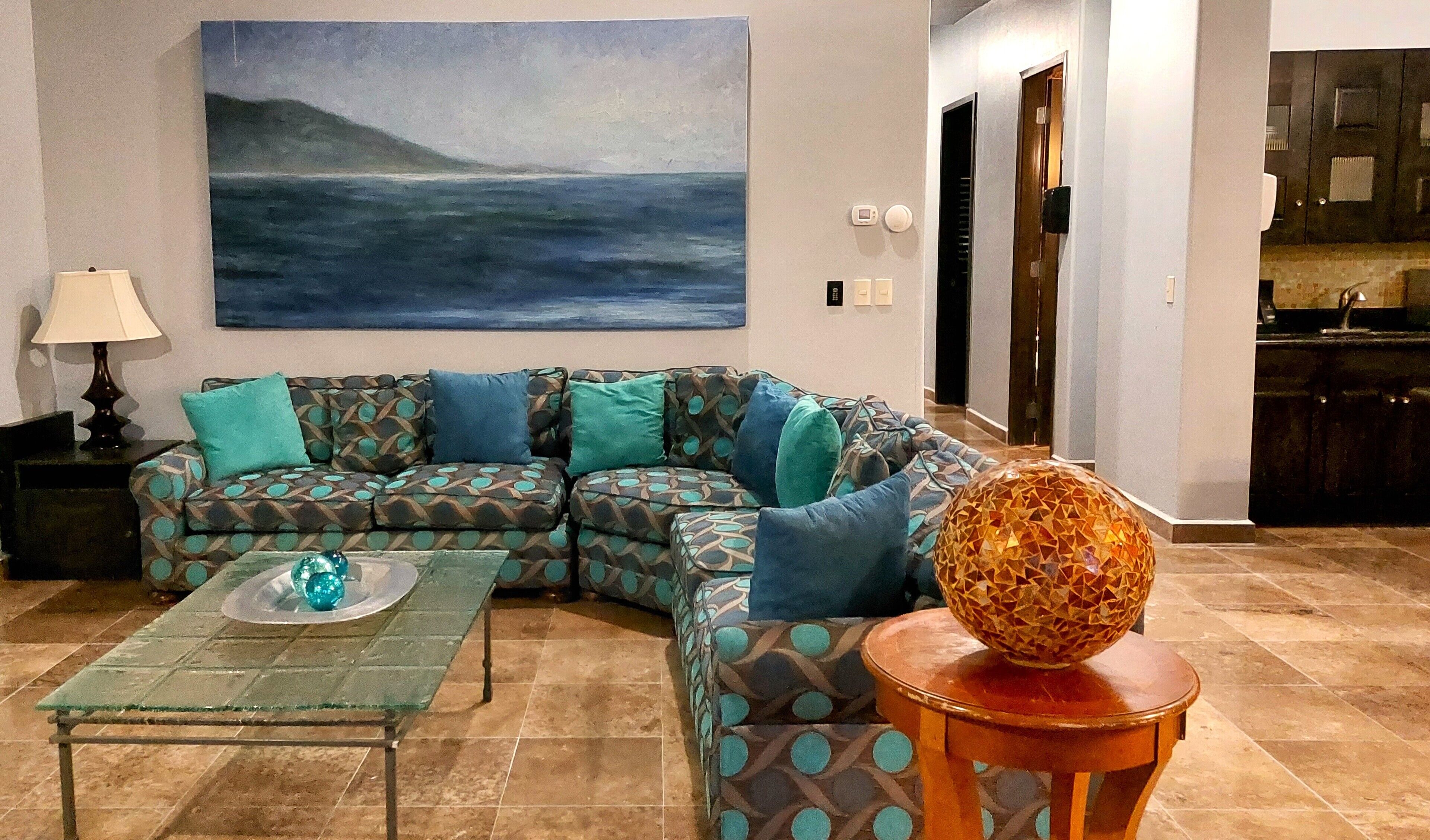 luxury suite, 2 bedrooms, ocean view | living area | 60-inch plasma tv with cable channels, tv