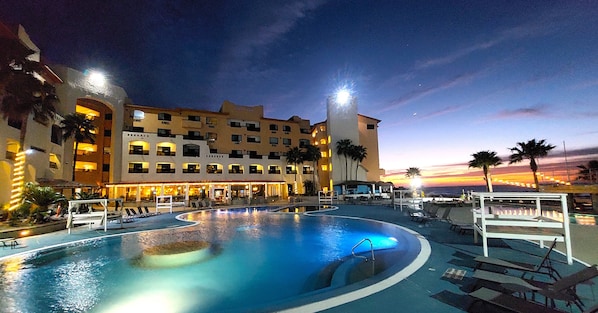 2 outdoor pools, open 8:00 AM to 10:00 PM, pool cabanas (surcharge)