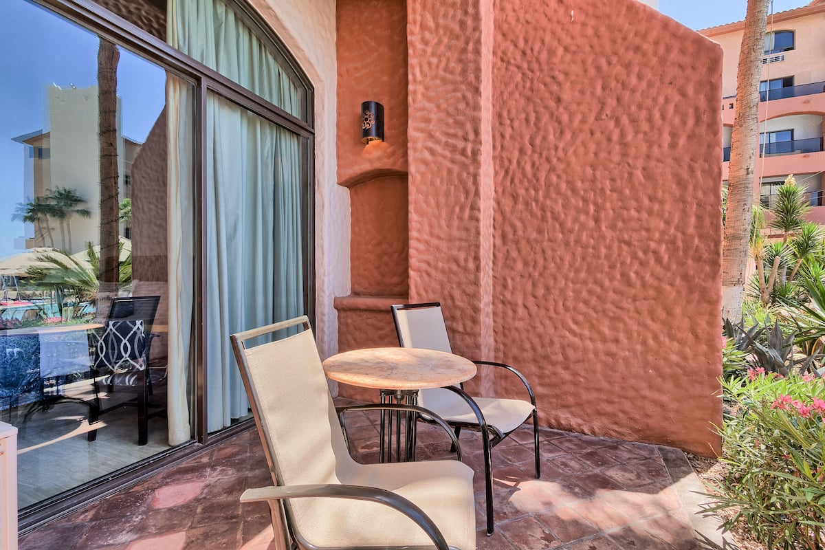 Deluxe Double Room, Patio, Pool View | Terrace/patio