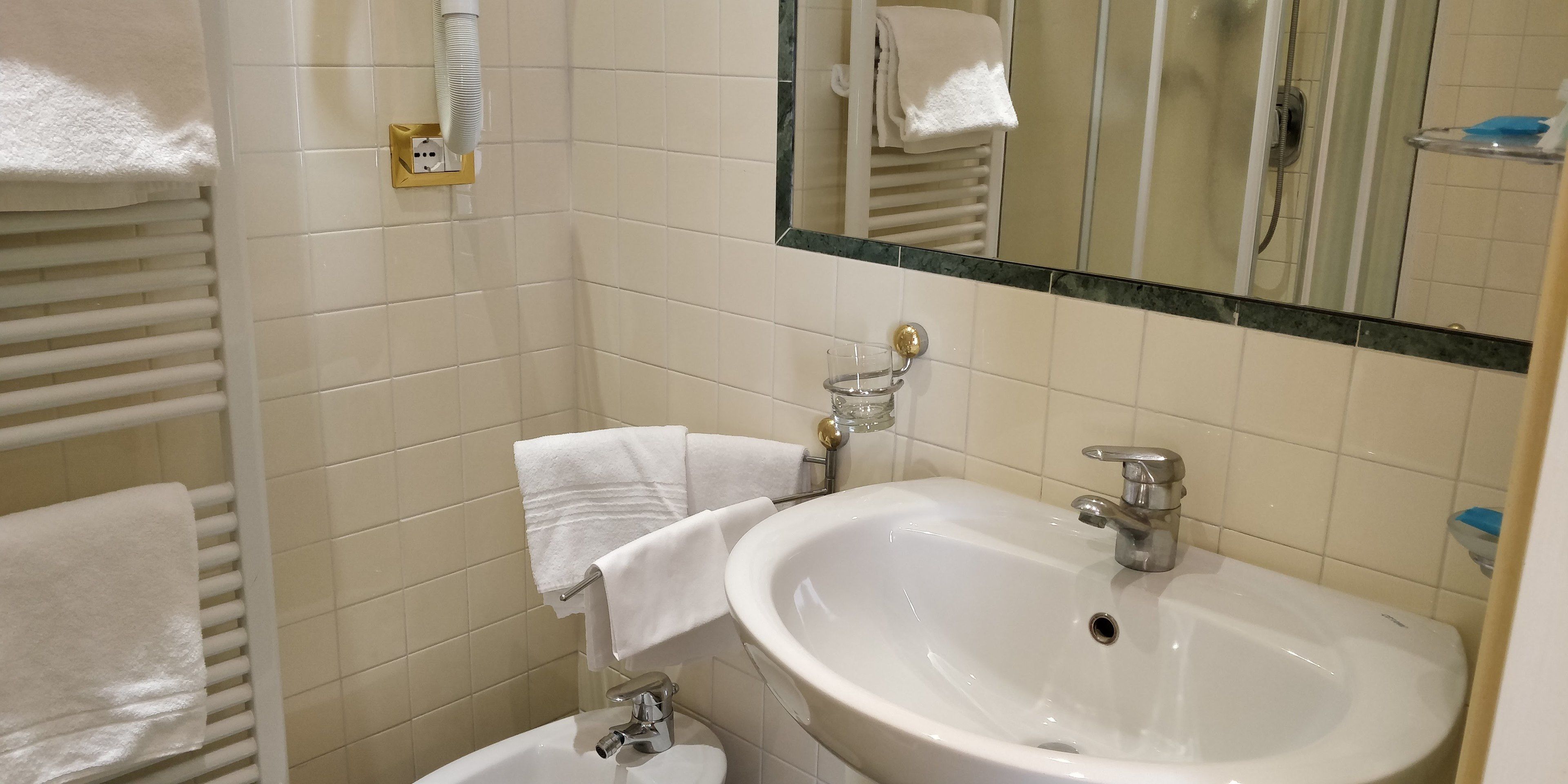superior room | bathroom | shower, rainfall showerhead, hair dryer, bidet