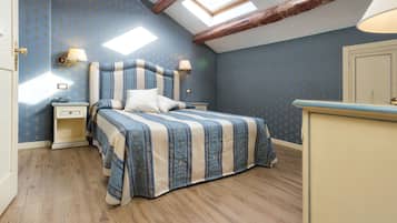 Premium bedding, down duvets, in-room safe, desk