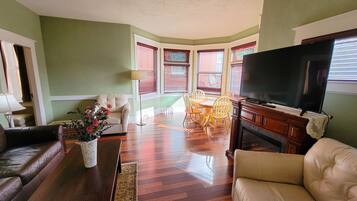 Suite, 1 Schlafzimmer, zum Garten hin | Wohnzimmer