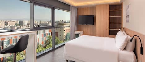 Quarto executivo, 1 cama King, para não fumantes, no canto | Vista para a cidade