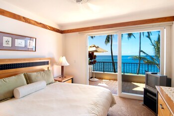 Premium bedding, in-room safe, individually decorated at Whalers Cove Oceanfront Resort