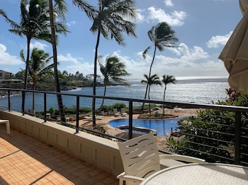 Condo, 2 Bedrooms, Kitchen, Partial Ocean View | Premium bedding, in-room safe, individually decorated at Whalers Cove Oceanfront Resort