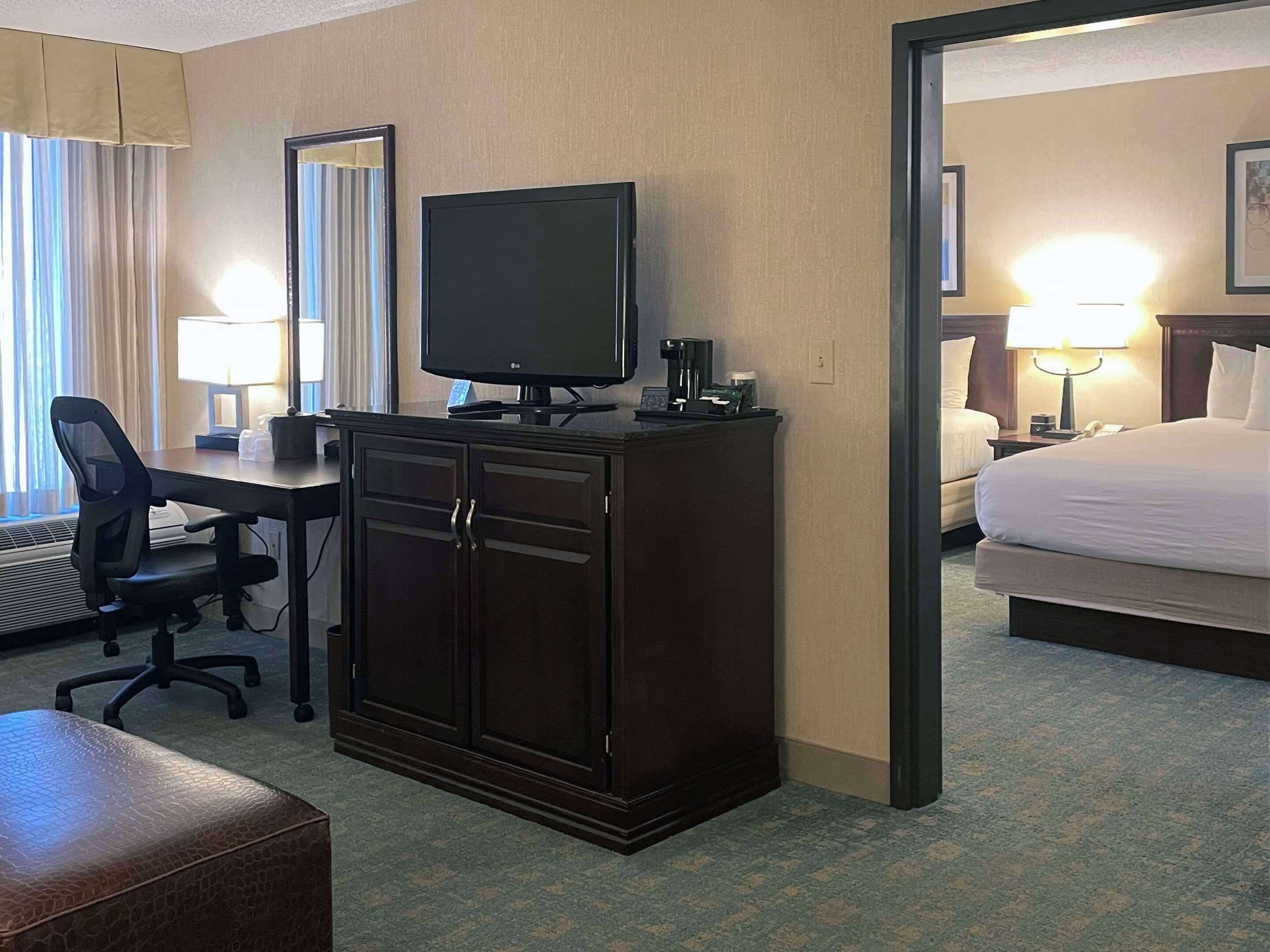 suite, 2 queen beds, non smoking | desk, iron/ironing board, free cots/infant beds, rollaway beds