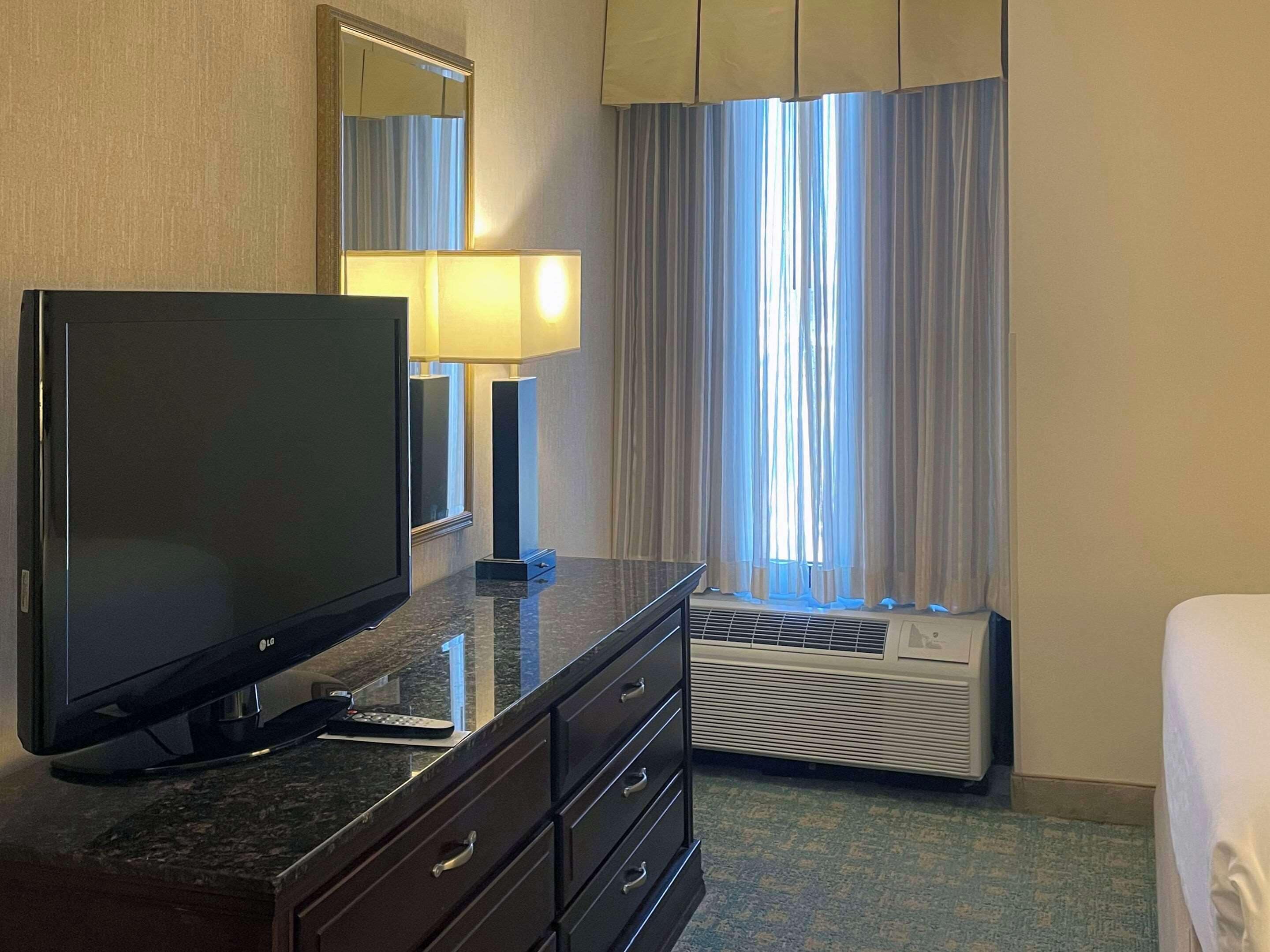 suite, 2 queen beds, non smoking | desk, iron/ironing board, free cots/infant beds, rollaway beds