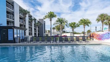 Outdoor pool, pool umbrellas, sun loungers