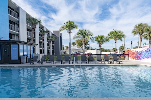 Outdoor pool, pool umbrellas, sun loungers