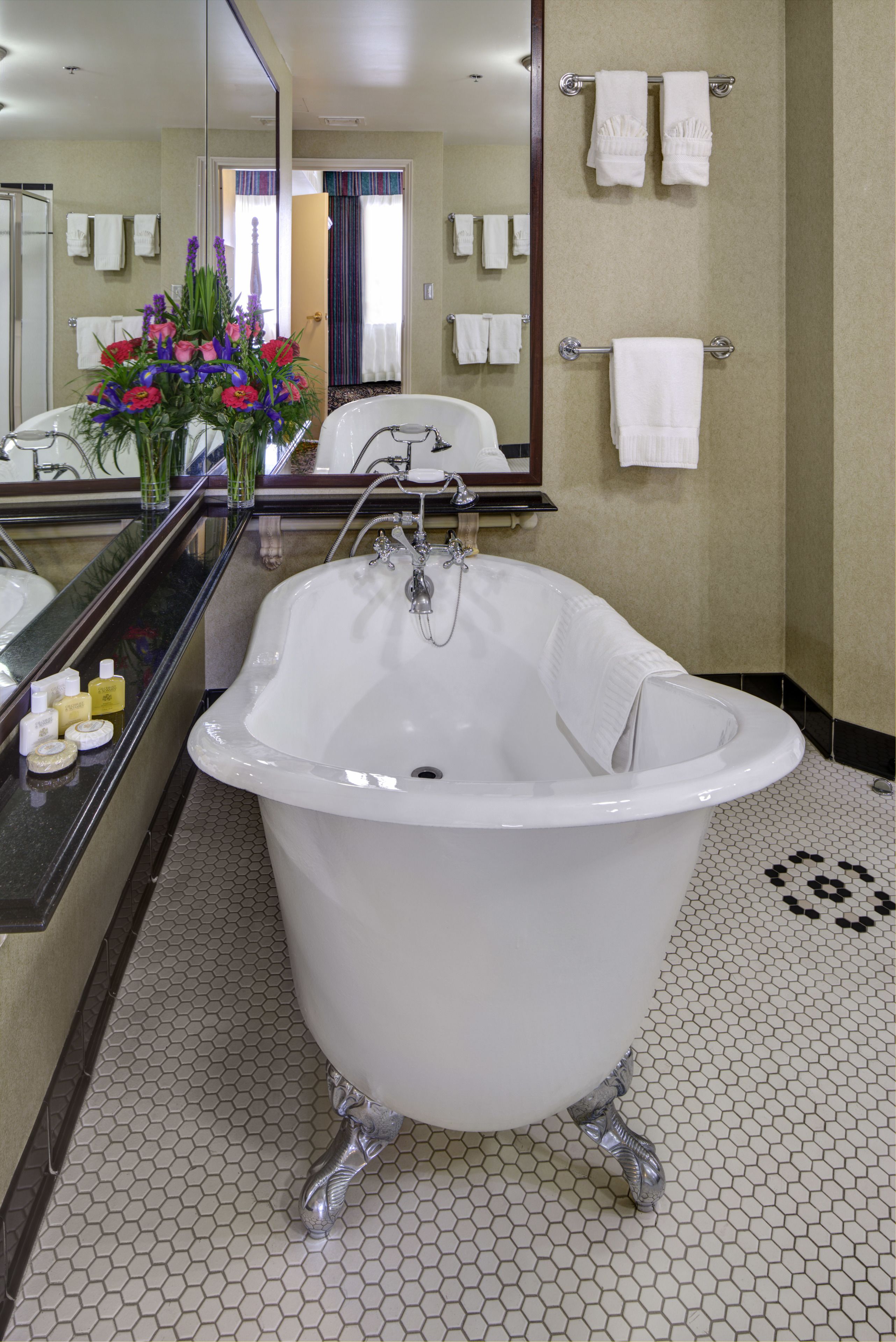 presidential suite, 1 king bed | bathroom | separate bathtub and shower, free toiletries, hair dryer, towels