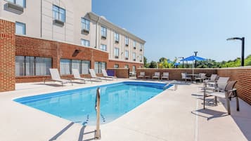 Seasonal outdoor pool, open 6:00 AM to 11:00 PM, pool umbrellas