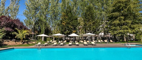 Seasonal outdoor pool, pool umbrellas, pool loungers