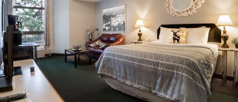 Habitación | Tabla de planchar con plancha, wifi gratis, ropa de cama