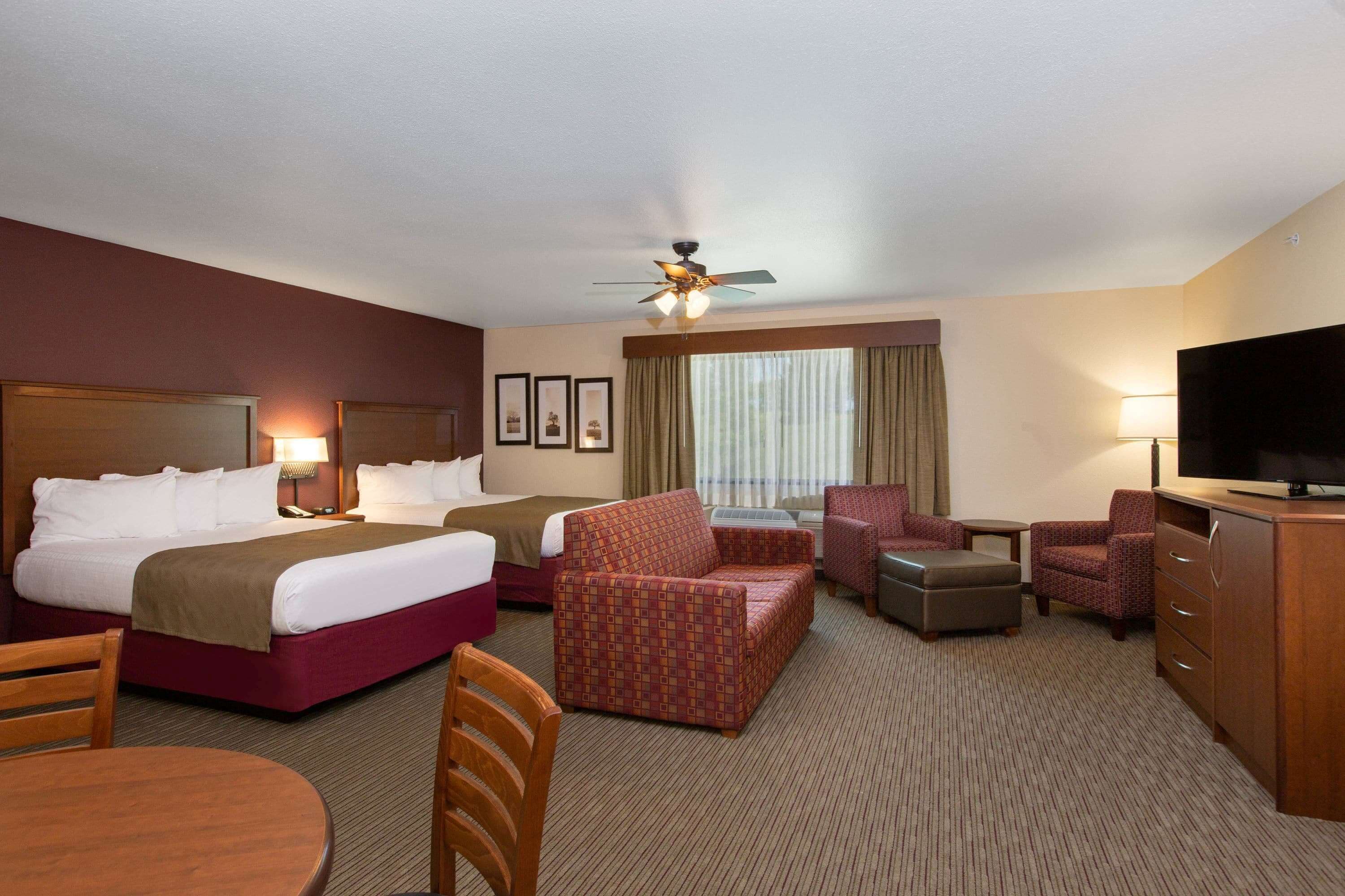 suite, 2 queen beds, non smoking | in-room safe, desk, laptop workspace, soundproofing