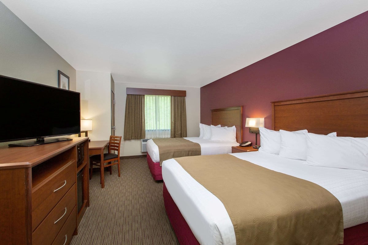 Room, 2 Queen Beds, Non Smoking | In-room safe, desk, laptop workspace, soundproofing