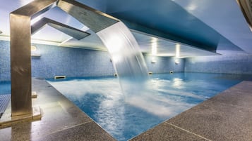 Indoor pool, seasonal outdoor pool, pool umbrellas, pool loungers