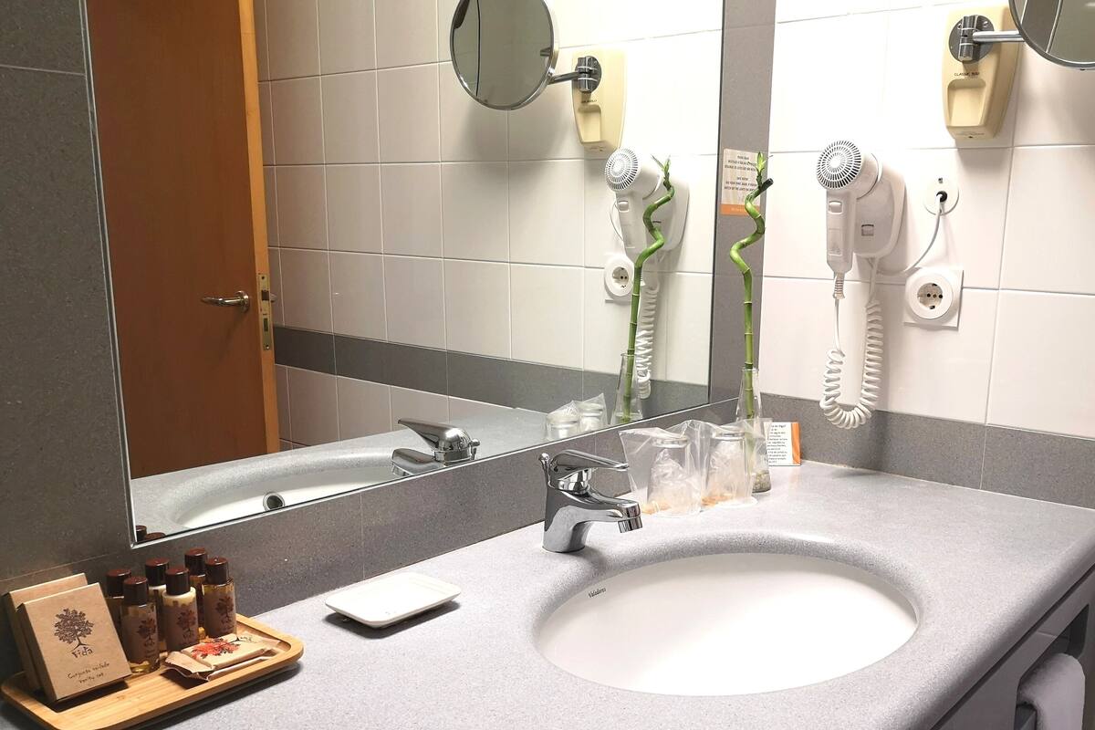 free toiletries, hair dryer, bidet, towels