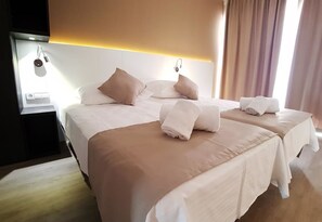 Standard Room | 1 bedroom, down comforters, in-room safe, desk