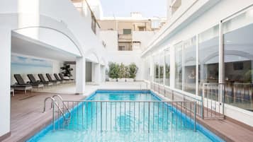 Outdoor pool, pool umbrellas, pool loungers