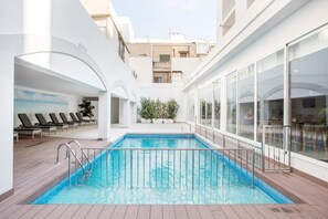 Outdoor pool, pool umbrellas, pool loungers