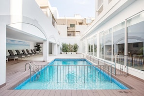 Outdoor pool, pool umbrellas, pool loungers